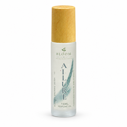 Allure perfume oil 15 mL roll-on with wooden cap on a white background