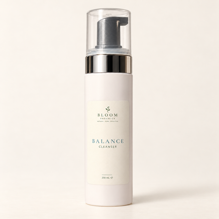 Bloom Organics Balance Cleanser, 200 mL pump bottle on a warm ivory background.