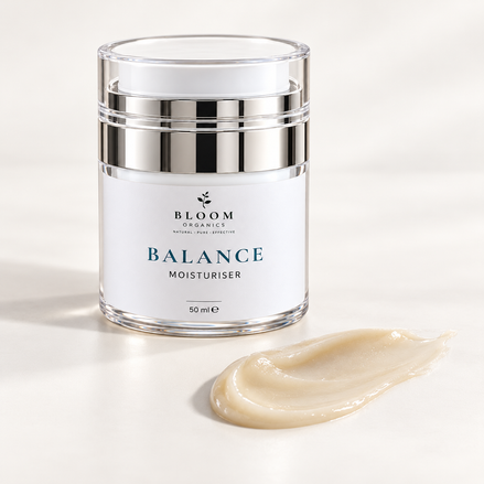 Bloom Balance Moisturiser beside an illustrative beige cream swatch, based on the actual product colour.