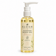 Bloom Botanical Body Oil 100 mL in a clear bottle with white pump on a white background
