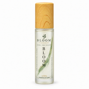 Bloom perfume oil 15 mL roll-on with wooden cap and green label on a white background