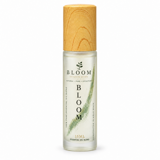 Bloom perfume oil 15 mL roll-on with wooden cap and green label on a white background