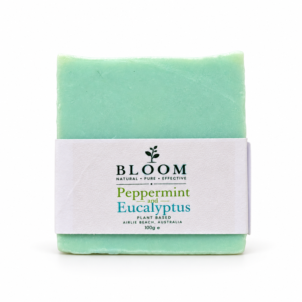 Bloom Peppermint and Eucalyptus plant-based soap, 100 g, with its mint green bar and Airlie Beach label on a white background.