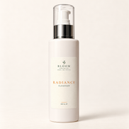 Bloom Organics Radiance Cleanser, 200 mL pump bottle on a warm ivory-white background.