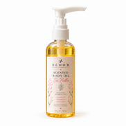 Si Bella scented body oil 100 mL in a clear bottle with white pump and golden oil on a white background