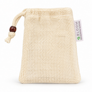 Single Bloom soap saver pouch in cream mesh with drawstring on a white background
